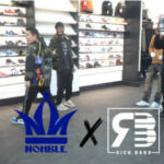 Rick Bars and Danny Nohble do giveaway in Dyckman Clothing store