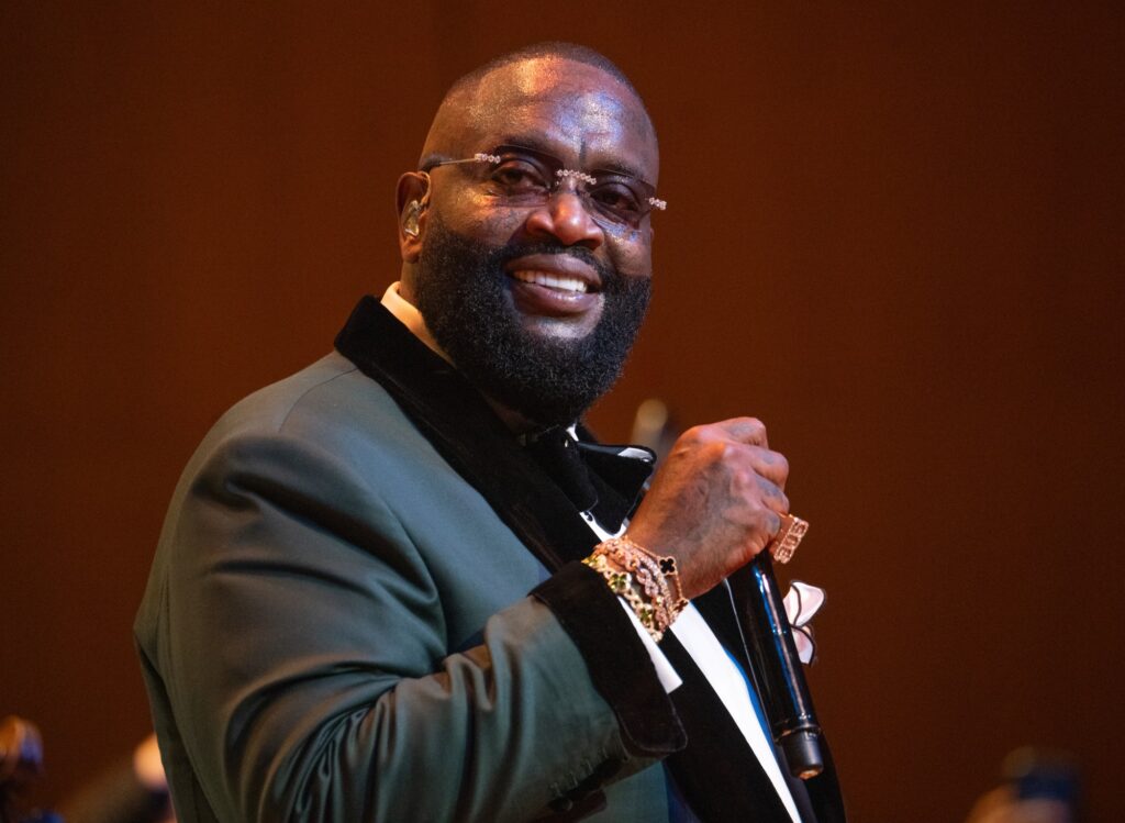Rick Ross Addresses Viral Video of Him Flying Commercial